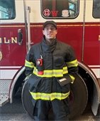 Image of a firefighter wearing new PFAS-free gear.